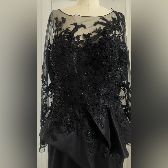 Terani Couture Embroidered Long Sleeve Front Slit Ruffled Mermaid Gown.
